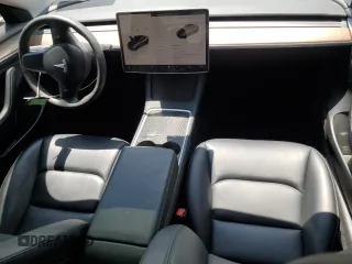 2023 Tesla Model 3 with VIN 5YJ3E1EA4PF614129, listed as a Copart auction lot 62019385 with 23,218 mi miles and Salvage title. Bid and sale history available at DreamBid. Image 8.