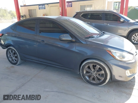 2012 Hyundai Accent GLS with VIN KMHCU4AE5CU246327, listed as a IAAI auction lot 42124657 with 139,287 mi miles. Bid and sale history available at carsss.com. Image 13.