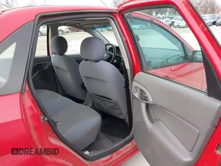 2004 Ford Focus ZTS with VIN 1FAFP38Z64W156191, listed as a IAAI auction lot 41553142 with Not Provided miles and . Bid and sale history available at carsss.com. Image 8.