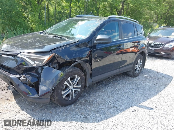 2017 Toyota RAV4 LE with VIN 2T3BFREV5HW651308, listed as a IAAI auction lot 42701783 with 112,829 mi miles and . Bid and sale history available at DreamBid. Image 17.