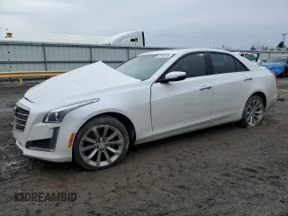2019 Cadillac CTS Luxury AWD with VIN 1G6AX5SX5K0107297, listed as a Copart auction lot 47106735 with 35,337 mi miles and Salvage title. Bid and sale history available at DreamBid. Image 1.