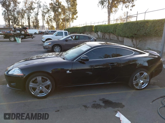 2008 Jaguar XK with VIN SAJWA43B985B23987, listed as a IAAI auction lot 41197091 with 54,803 mi miles. Bid and sale history available at carsss.com. Image 14.