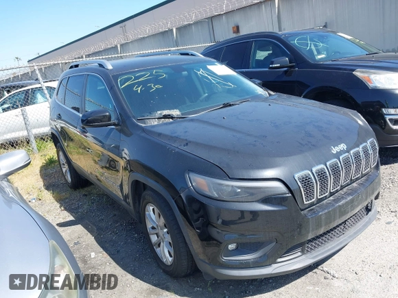 2019 Jeep Cherokee Latitude with VIN 1C4PJLCB2KD331698, listed as a IAAI auction lot 41175485 with 85,821 mi miles. Bid and sale history available at carsss.com. Image 1.