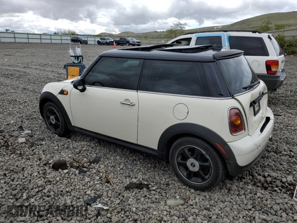 2007 MINI Hardtop with VIN WMWMF33567TT56922, listed as a Copart auction lot 56598665 with 66,605 mi miles and Salvage title. Bid and sale history available at DreamBid. Image 2.
