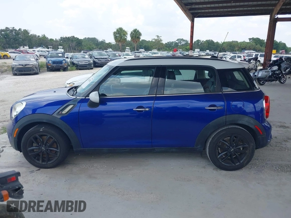 2016 MINI Countryman S with VIN WMWZC3C50GWT08698, listed as a IAAI auction lot 42493302 with 61,306 mi miles and . Bid and sale history available at DreamBid. Image 14.