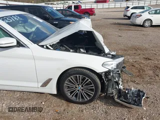 2018 BMW 5 Series 530i with VIN WBAJA5C5XJWA56855, listed as a IAAI auction lot 41128814 with Not Provided miles and . Bid and sale history available at DreamBid. Image 19.