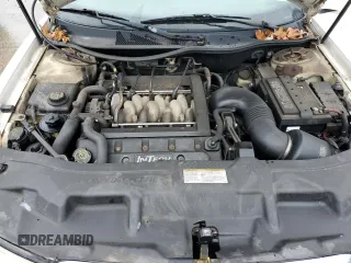 1999 Lincoln Continental with VIN 1LNHM97V3XY667567, listed as a Copart auction lot 84194854 with 137,163 mi miles and Salvage Title. Bid and sale history available at carsss.com. Image 11.