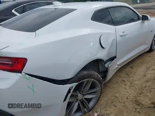 2018 Chevrolet Camaro 1LT with VIN 1G1FB1RS2J0142116, listed as a IAAI auction lot 42235855 with 85,908 mi miles and . Bid and sale history available at DreamBid. Image 6.