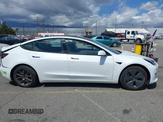2023 Tesla Model 3 with VIN 5YJ3E1EA5PF502066, listed as a IAAI auction lot 41934960 with 17,926 mi miles and . Bid and sale history available at carsss.com. Image 14.