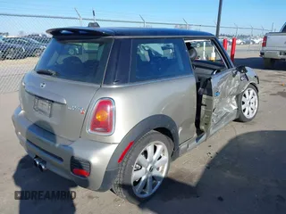 2007 MINI Hardtop S with VIN WMWMF73567TL91385, listed as a IAAI auction lot 41866865 with 114,778 mi miles and . Bid and sale history available at DreamBid. Image 4.