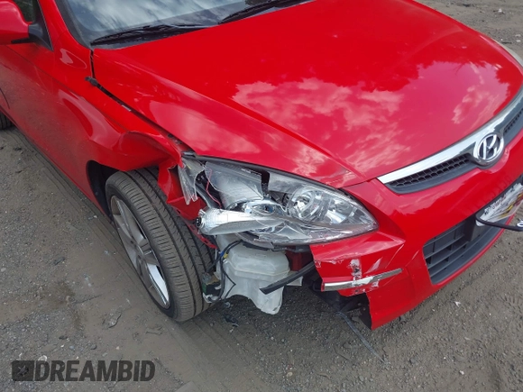 2010 Hyundai Elantra Touring SE with VIN KMHDC8AE2AU075841, listed as a IAAI auction lot 40128211 with 173,541 mi miles. Bid and sale history available at carsss.com. Image 6.