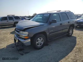 2001 Chevrolet Tahoe LS with VIN 1GNEK13T01J313998, listed as a Copart auction lot 43062005 with 213,587 mi miles and Salvage Title. Bid and sale history available at carsss.com. Image 1.