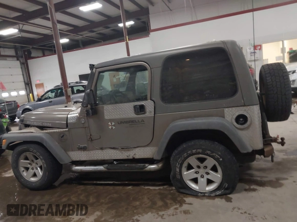 2005 Jeep Wrangler Rubicon with VIN 1J4FA69S65P311732, listed as a IAAI auction lot 41442147 with 174,277 mi miles. Bid and sale history available at carsss.com. Image 14.