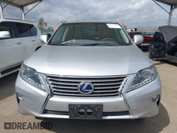 2013 Lexus RX 450h with VIN JTJZB1BAXD2409160, listed as a IAAI auction lot 41916721 with 62,599 mi miles and . Bid and sale history available at DreamBid. Image 13.