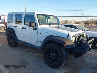2014 Jeep Wrangler Unlimited Sahara with VIN 1C4BJWEG0EL273475, listed as a IAAI auction lot 41515425 with 128,900 mi miles. Bid and sale history available at carsss.com. Image 1.