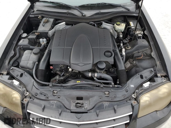 2005 Chrysler Crossfire z VIN 1C3AN59L35X041726, wystawiony jako Copart lot #78260164 z przebiegiem Nie podano mil oraz Nie do naprawy. Historia ofert i sprzedaży dostępna na DreamBid. Obrazek 11.
