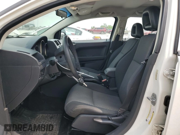 2009 Dodge Caliber SXT z VIN 1B3HB48A89D198108, wystawiony jako Copart lot #58910415 z przebiegiem 176 257 mil mil oraz Czysty tytuł • Clean title. Historia ofert i sprzedaży dostępna na DreamBid. Obrazek 7.