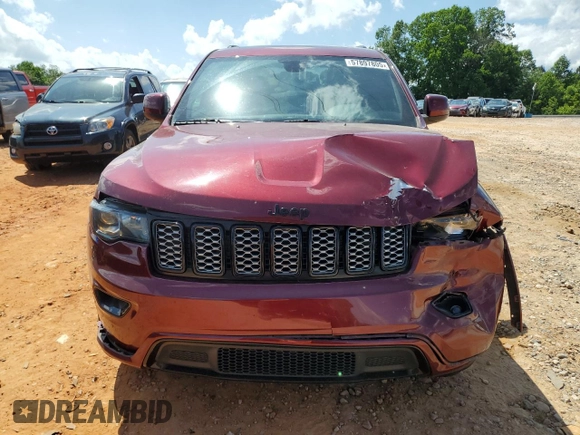 2017 Jeep Grand Cherokee Altitude with VIN 1C4RJEAG9HC702924, listed as a Copart auction lot 57897805 with 133,796 mi miles and Salvage title. Bid and sale history available at DreamBid. Image 5.