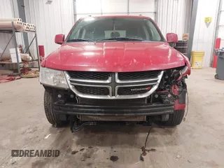 2012 Dodge Journey SXT z VIN 3C4PDDBG4CT397806, wystawiony jako IAAI lot #41333394 z przebiegiem 122 804 mil mil oraz . Historia ofert i sprzedaży dostępna na DreamBid. Obrazek 6.
