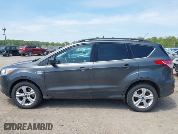 2016 Ford Escape SE with VIN 1FMCU9GX8GUB42944, listed as a IAAI auction lot 42171770 with 120,041 mi miles. Bid and sale history available at carsss.com. Image 14.