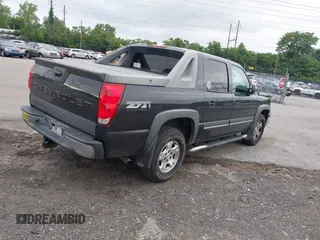 2004 Chevrolet Avalanche Z71 z VIN 3GNEK12T94G216824, wystawiony jako IAAI lot #42457339 z przebiegiem 150 650 mil mil oraz . Historia ofert i sprzedaży dostępna na DreamBid. Obrazek 4.