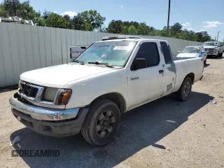 1999 Nissan Frontier XE with VIN 1N6DD26S3XC326231, listed as a Copart auction lot 51710615 with 228,174 mi miles and Salvage title. Bid and sale history available at DreamBid. Image 1.