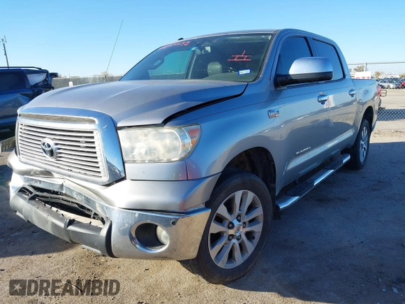 2012 Toyota Tundra 4WD Truck LTD with VIN 5TFHW5F18CX251584, listed as a IAAI auction lot 41054238 with 124,892 mi miles. Bid and sale history available at carsss.com. Image 2.