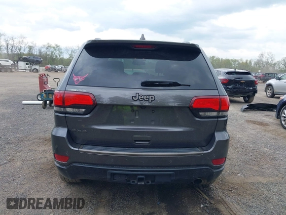 2016 Jeep Grand Cherokee Limited 75th Anniversary with VIN 1C4RJFBG6GC399099, listed as a IAAI auction lot 42148866 with 139,969 mi miles and . Bid and sale history available at DreamBid. Image 17.