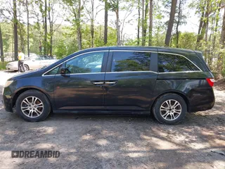 2013 Honda Odyssey EX-L with VIN 5FNRL5H69DB025040, listed as a IAAI auction lot 42078699 with 181,470 mi miles and . Bid and sale history available at carsss.com. Image 14.