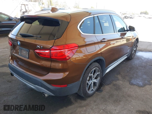 2017 BMW X1 xDrive28i with VIN WBXHT3C34H5F75885, listed as a IAAI auction lot 42655580 with 54,609 mi miles and . Bid and sale history available at DreamBid. Image 4.