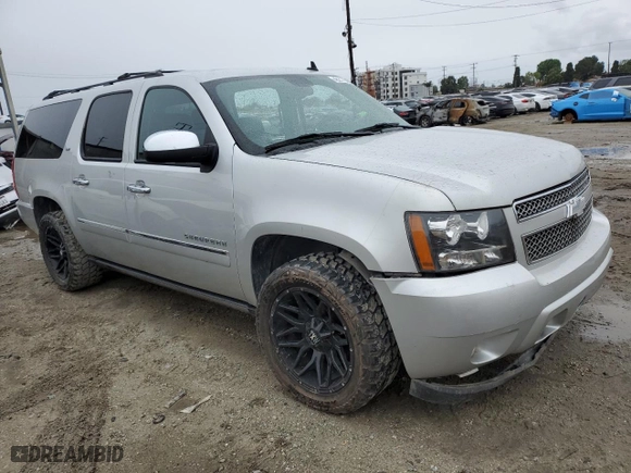 2011 Chevrolet Suburban LTZ with VIN 1GNSKKE37BR100328, listed as a Copart auction lot 48217925 with NaN miles and Salvage Title. Bid and sale history available at carsss.com. Image 4.