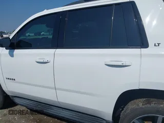 2019 Chevrolet Tahoe LT with VIN 1GNSCBKC2KR128944, listed as a IAAI auction lot 42600686 with 92,980 mi miles and . Bid and sale history available at DreamBid. Image 15.