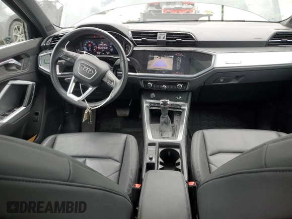 2020 Audi Q3 Premium with VIN WA1AECF31L1002342, listed as a Copart auction lot 60729665 with 29,154 mi miles and Salvage title. Bid and sale history available at DreamBid. Image 8.