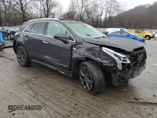 2018 Cadillac XT5 Luxury AWD with VIN 1GYKNDRS8JZ195858, listed as a Copart auction lot 84135934 with 66,128 mi miles and Salvage Title. Bid and sale history available at DreamBid. Image 4.