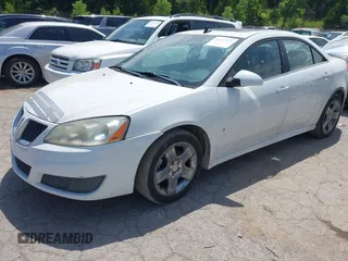 2009 Pontiac G6 1SB z VIN 1G2ZJ57B094267612, wystawiony jako IAAI lot #42467721 z przebiegiem 160 532 mil mil oraz . Historia ofert i sprzedaży dostępna na DreamBid. Obrazek 2.