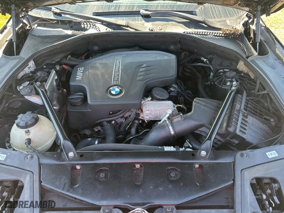 2015 BMW 5 Series 528i with VIN WBA5A5C54FD523446, listed as a Copart auction lot 49319235 with 165,596 mi miles and Clean Title. Bid and sale history available at carsss.com. Image 7.