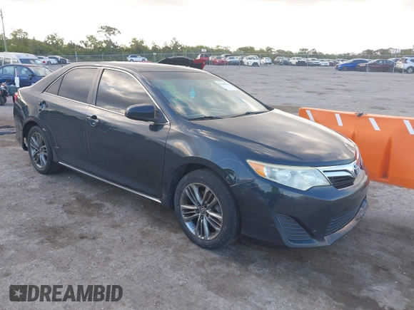2014 Toyota Camry L with VIN 4T4BF1FK7ER349244, listed as a IAAI auction lot 42040599 with 186,545 mi miles. Bid and sale history available at carsss.com. Image 1.