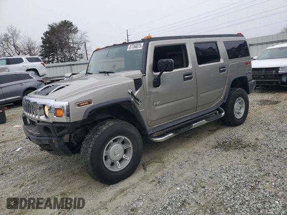2004 Hummer H2 with VIN 5GRGN23U24H118230, listed as a Copart auction lot 87764075 with 202,206 mi miles and Salvage Title. Bid and sale history available at carsss.com. Image 1.