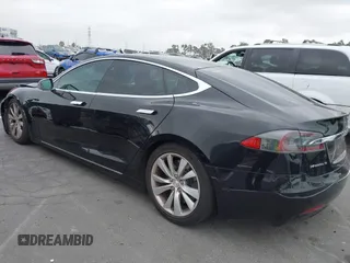 2017 Tesla Model S 100D with VIN 5YJSA1E26HF197176, listed as a IAAI auction lot 42565791 with 120,287 mi miles and . Bid and sale history available at DreamBid. Image 3.
