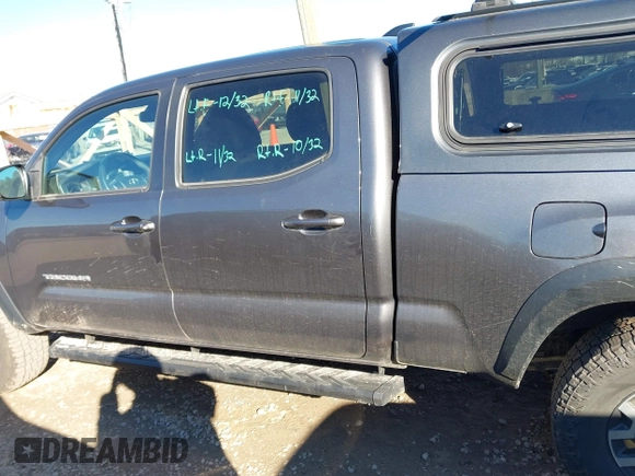 2021 Toyota Tacoma 4WD SR5 with VIN 5TFDZ5BN8MX058531, listed as a IAAI auction lot 41628820 with 102,004 mi miles. Bid and sale history available at carsss.com. Image 14.