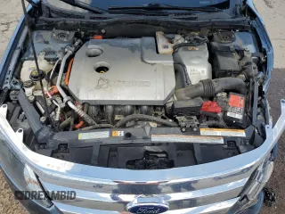 2012 Ford Fusion Hybrid z VIN 3FADP0L3XCR176552, wystawiony jako Copart lot #55787415 z przebiegiem 156 806 mil mil oraz Szkoda całkowita • Salvage title. Historia ofert i sprzedaży dostępna na DreamBid. Obrazek 11.