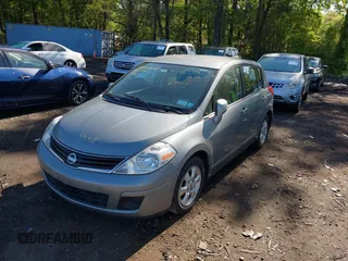 2012 Nissan Versa S with VIN 3N1BC1CP2CK804329, listed as a IAAI auction lot 39366678 with 167,539 mi miles. Bid and sale history available at carsss.com. Image 2.