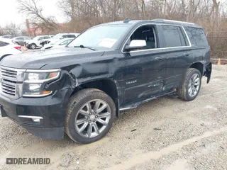 2016 Chevrolet Tahoe LTZ with VIN 1GNSKCKC2GR104305, listed as a IAAI auction lot 41697868 with 124,670 mi miles. Bid and sale history available at carsss.com. Image 6.