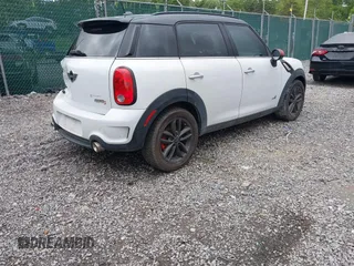 2012 MINI Countryman S z VIN WMWZC5C54CWL58610, wystawiony jako IAAI lot #42372195 z przebiegiem 133 556 mil mil oraz . Historia ofert i sprzedaży dostępna na DreamBid. Obrazek 4.