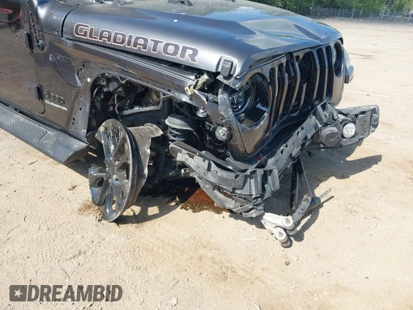 2021 Jeep Gladiator High Altitude z VIN 1C6HJTFG1ML597581, wystawiony jako IAAI lot #42191690 z przebiegiem 47 740 mil mil oraz . Historia ofert i sprzedaży dostępna na DreamBid. Obrazek 6.