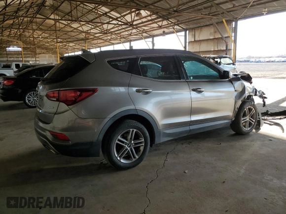 2018 Hyundai Santa Fe 2.4L с VIN 5NMZU3LB0JH055625, выставлен на аукционе Copart как лот 63696515 с пробегом 92 326 миль миль и Списание • Salvage title. История ставок и продаж доступна на DreamBid. Изображение 3.