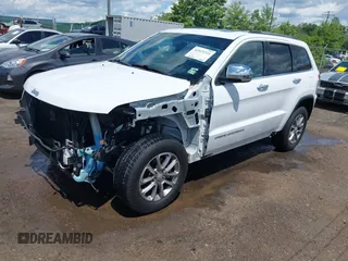 2014 Jeep Grand Cherokee Limited with VIN 1C4RJFBG3EC350648, listed as a IAAI auction lot 42523221 with 125,447 mi miles and . Bid and sale history available at DreamBid. Image 18.