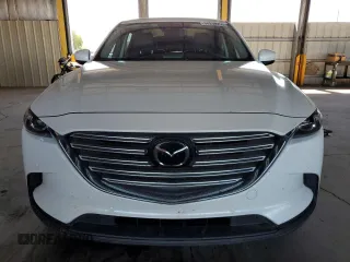 2020 Mazda CX-9 Touring with VIN JM3TCBCY1L0414112, listed as a Copart auction lot 58260255 with 66,773 mi miles and Salvage title. Bid and sale history available at DreamBid. Image 5.