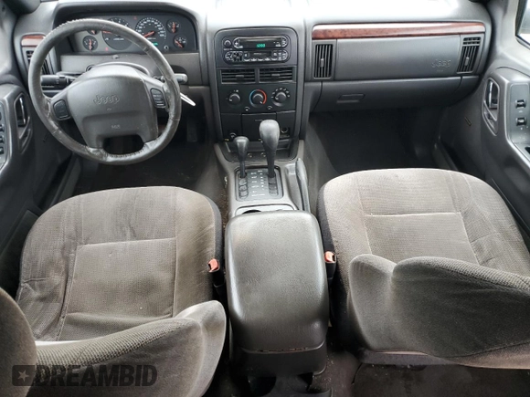 2000 Jeep Grand Cherokee Laredo z VIN 1J4GW48S8YC335926, wystawiony jako Copart lot #80693454 z przebiegiem 353 635 mil mil oraz Nie do naprawy • Non repairable. Historia ofert i sprzedaży dostępna na DreamBid. Obrazek 8.