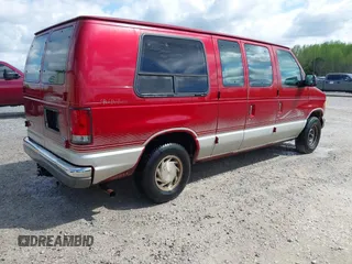 1997 Ford Econoline Commercial with VIN 1FDEE14L9VHB61839, listed as a IAAI auction lot 42016200 with 236,026 mi miles. Bid and sale history available at carsss.com. Image 4.